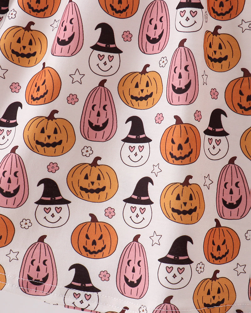 White fabric with orange pumpkins, witches, hearts, and stars all-over print