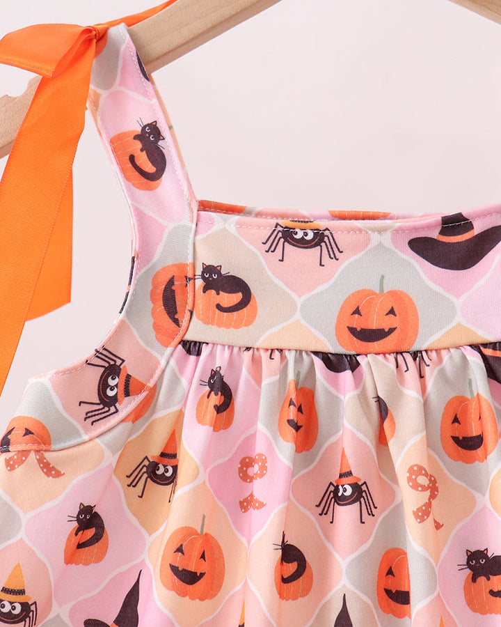 Pumpkin spider dress top with bow straps and gathered waist, pink patterned print