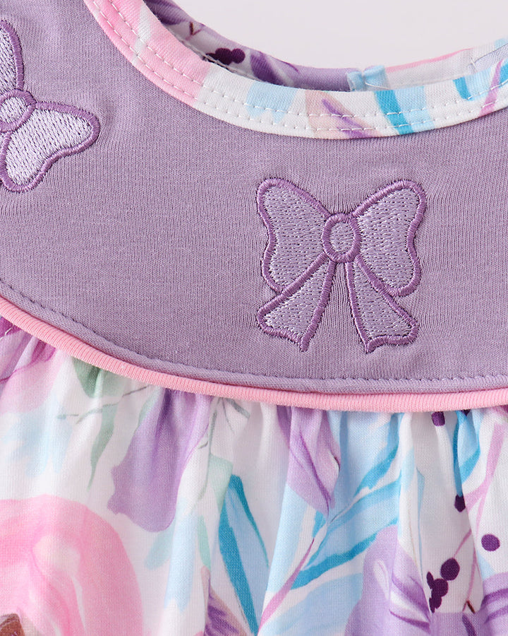 Bow embroidery on purple floral romper