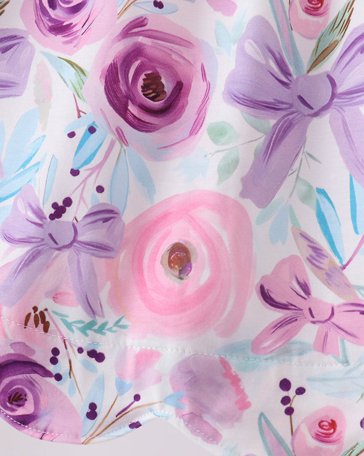 Watercolor rose and butterfly fabric in purple, pink, and light blue floral pattern