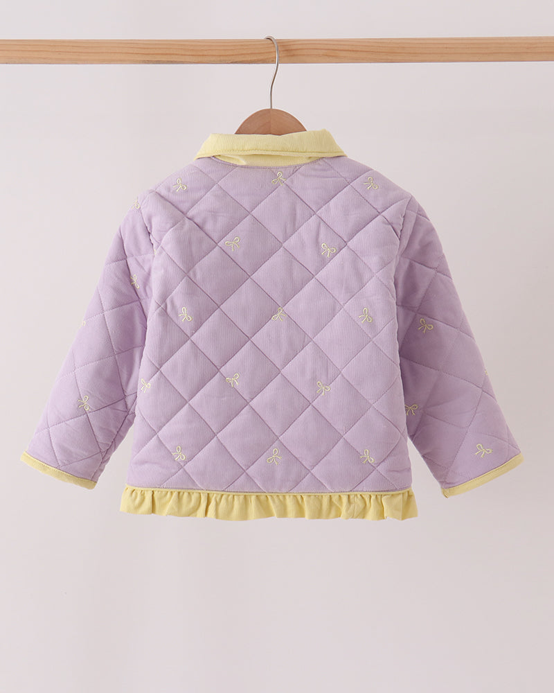 Back of lavender ruffle jacket with yellow collar trim and embroidered details