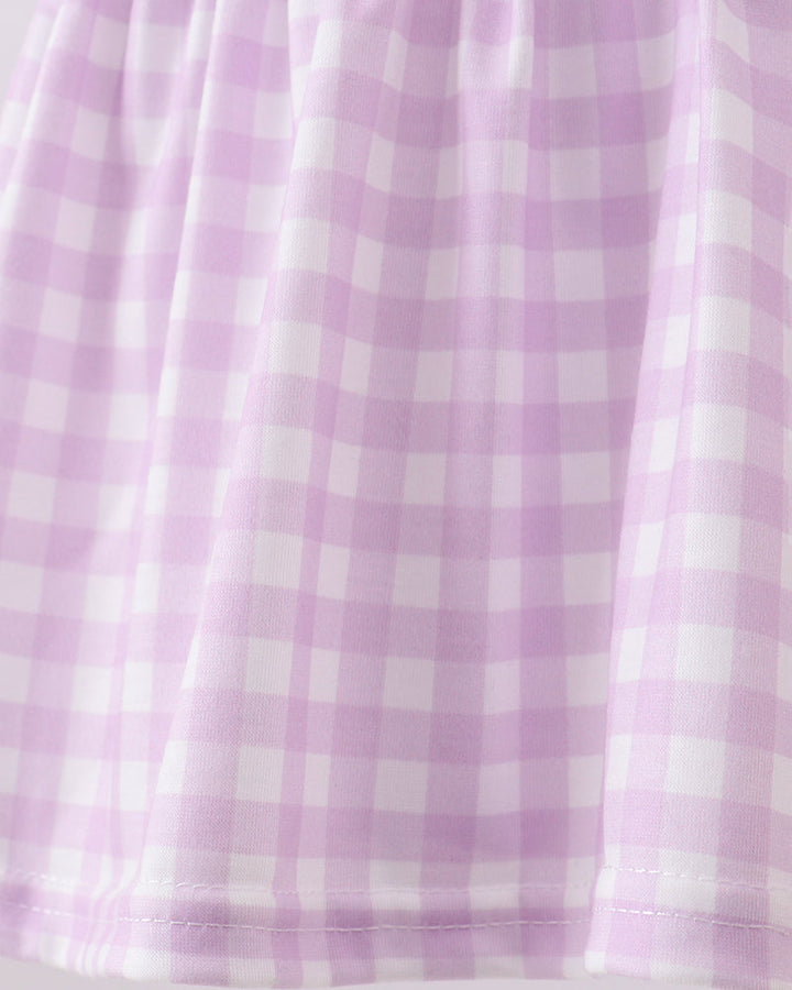 Close-up of a purple and white checkered fabric