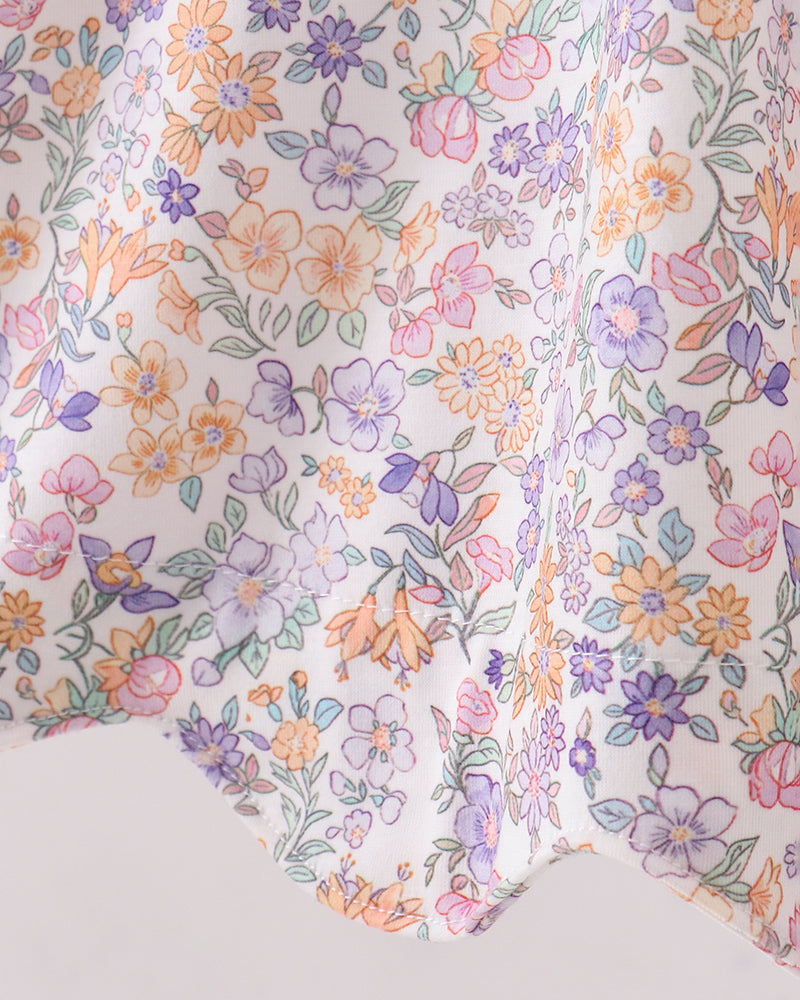 Floral patterned fabric with colorful flowers on a white background