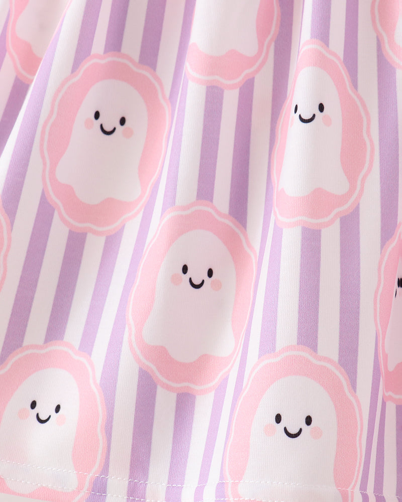 A close-up of a fabric surface with a repeating print of cute smiling ghosts in pink and white, set against a background of vertical lavender and white stripes.