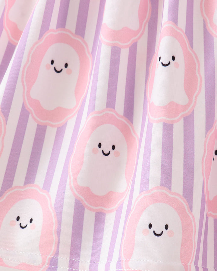 A close-up of a fabric surface with a repeating print of cute smiling ghosts in pink and white, set against a background of vertical lavender and white stripes.