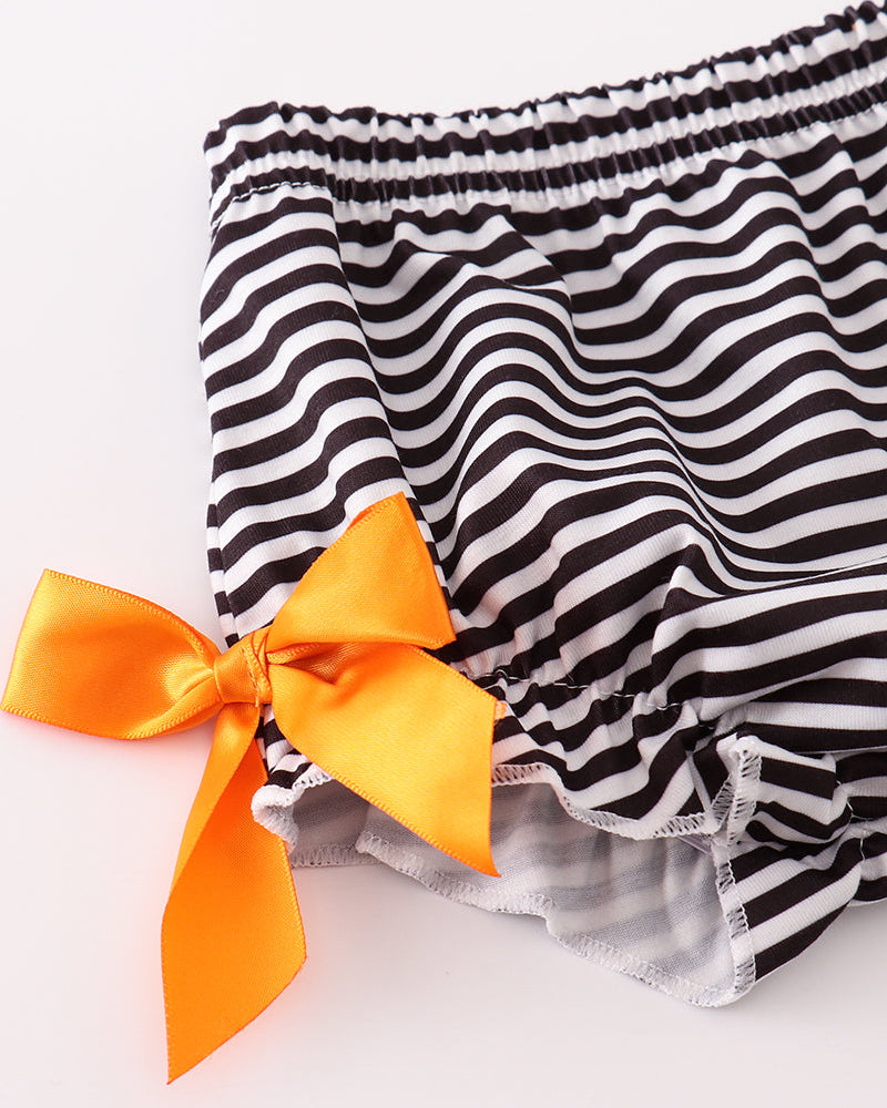 Black-and-white striped bloomers with elastic waistband and orange bow detail
