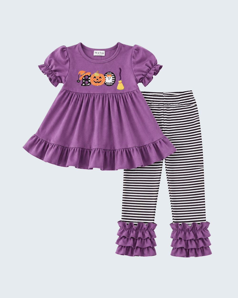 Purple ruffle dress with pumpkin-ghost applique, striped leggings with purple ruffle cuffs