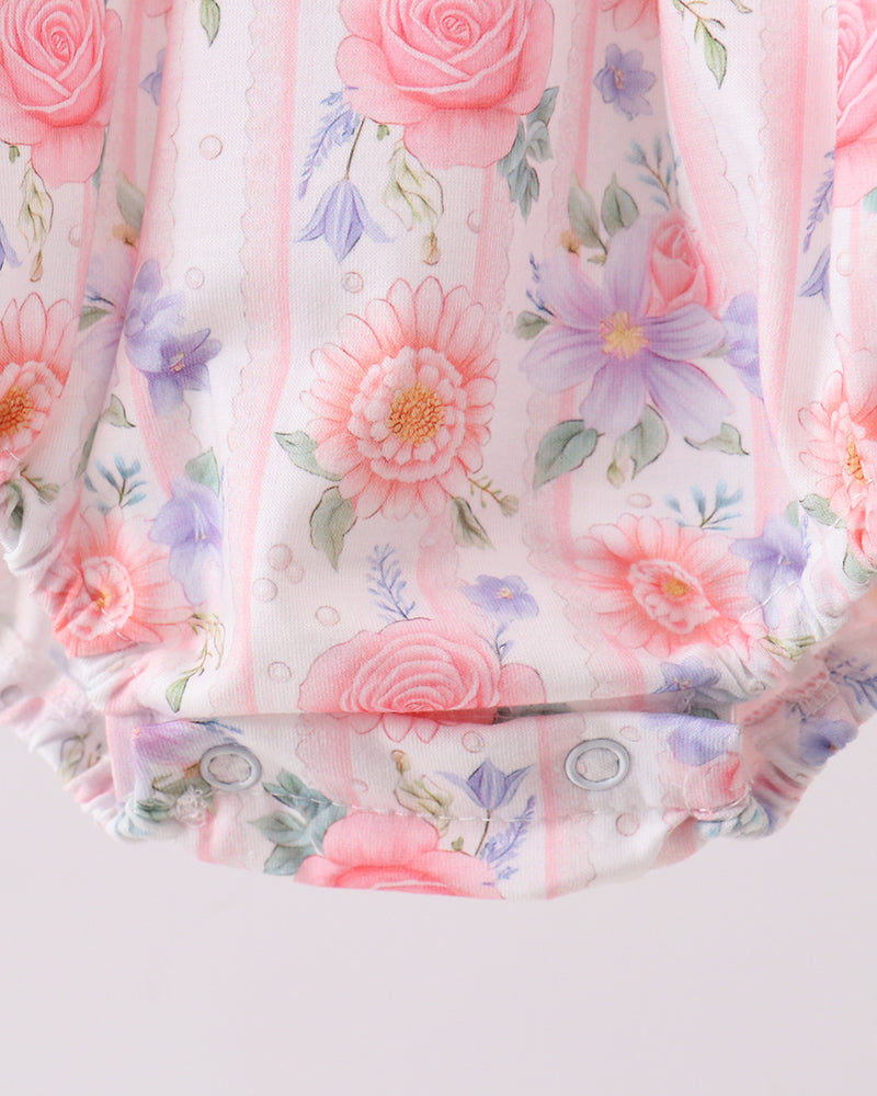 Floral romper with snap closure