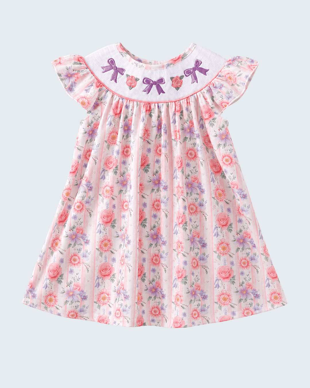 Floral dress with bow details on a light gray background
