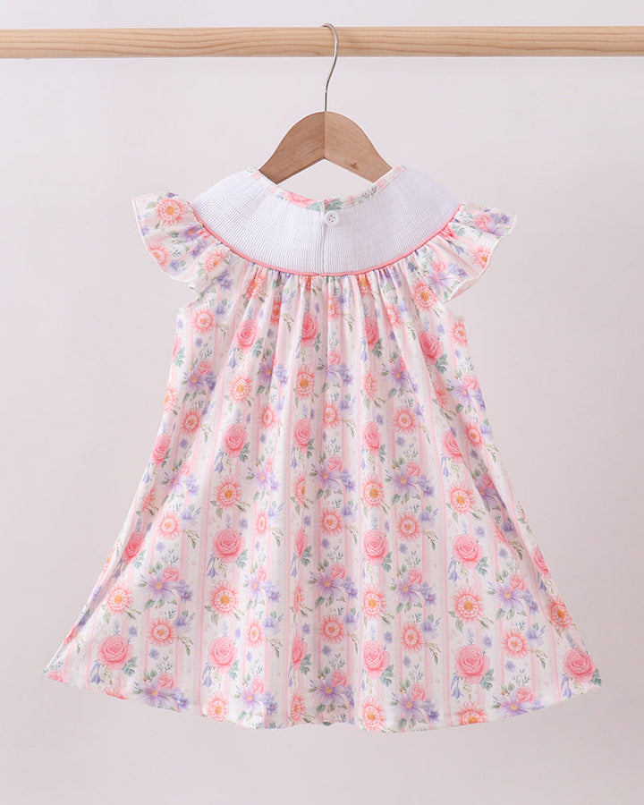 Purple Rose Bow Smocked Ruffle Dress on wooden hanger