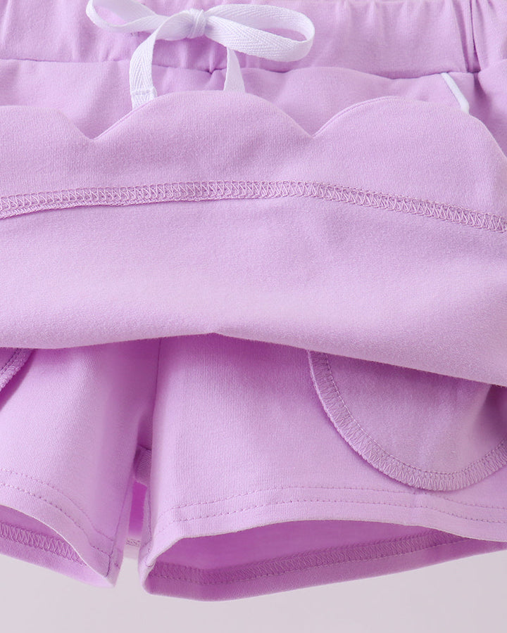 Lavender purple skort with scallop hem and ribbon bow at elastic waistband