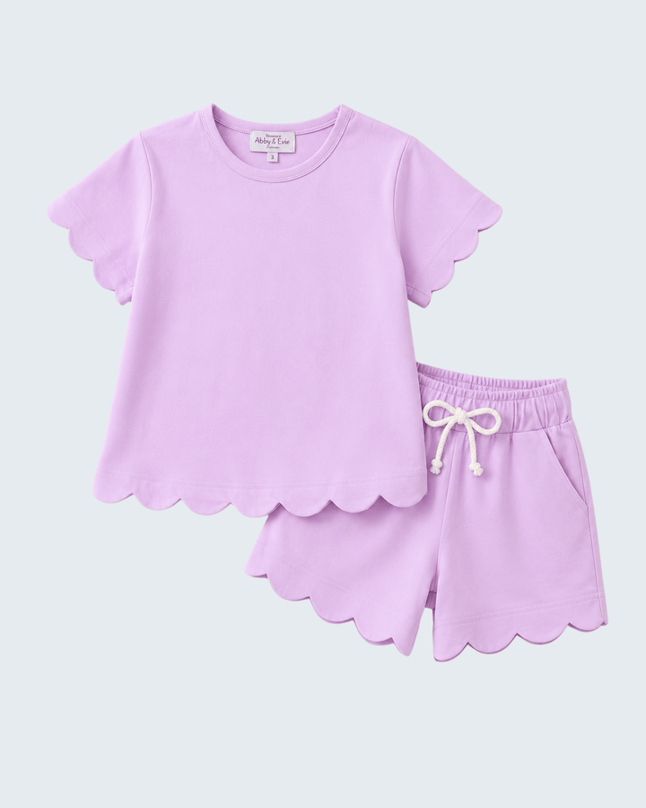 Lavender shorts set with scalloped edges on a white background