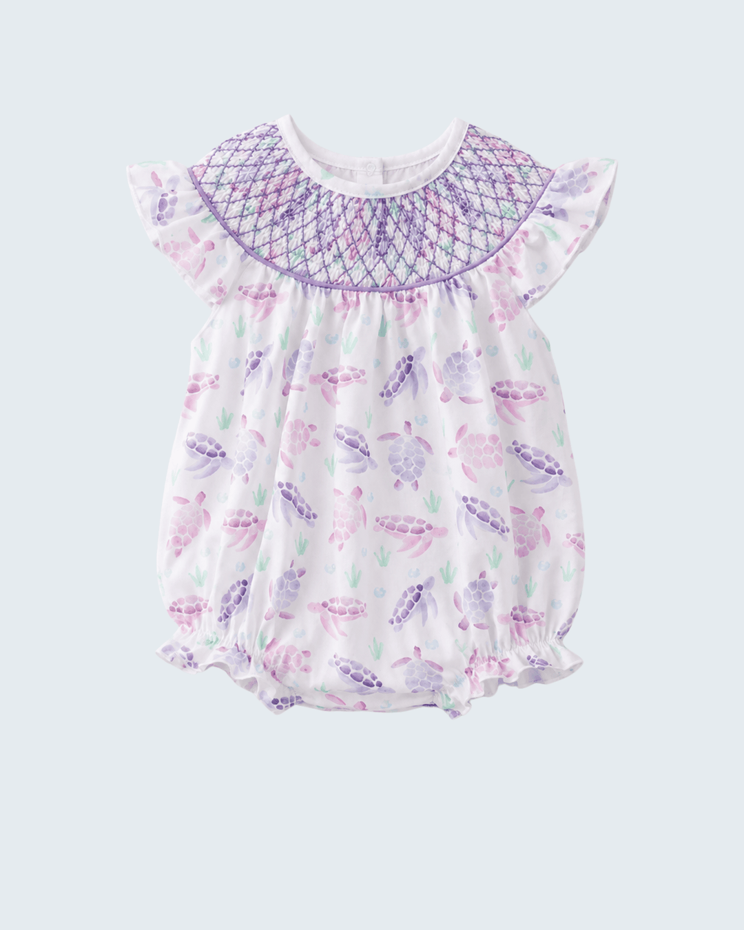 Baby romper with butterfly pattern on a light purple background