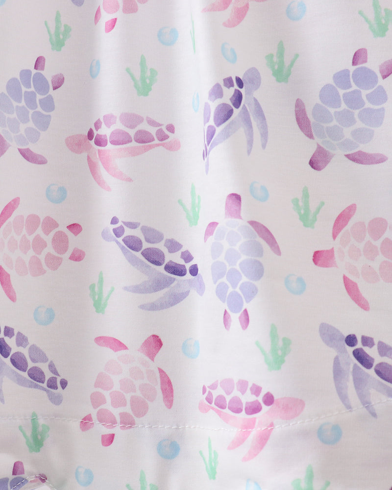 Pattern of colorful turtles on a white background
