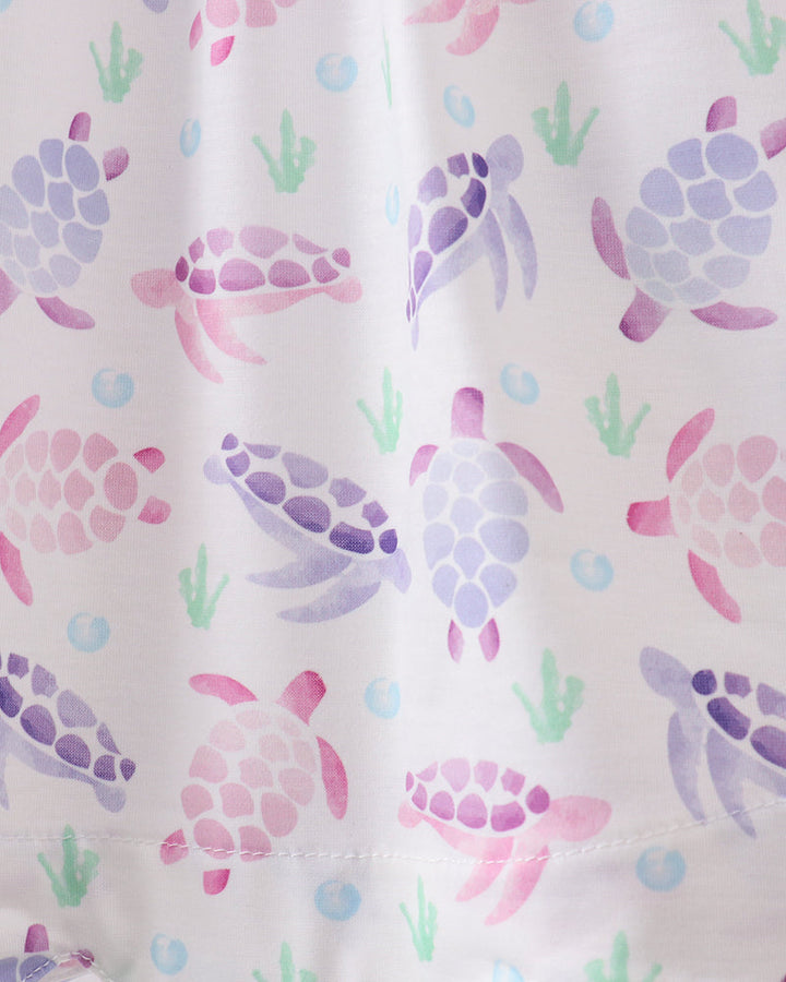 Pattern of colorful turtles on a white background