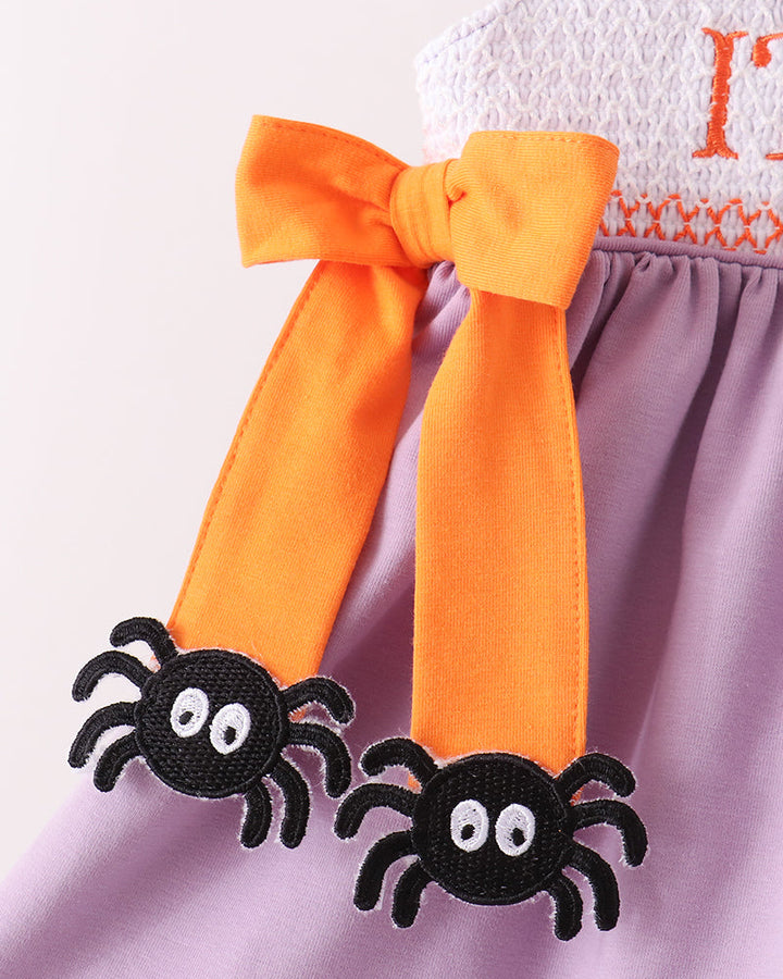 Purple bloomer with orange bow and black spider appliques