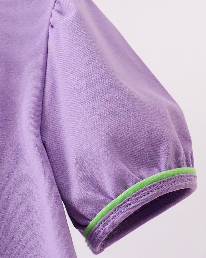 Purple dress sleeve with gathered cap and green-trim cuff edge