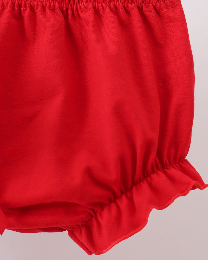 Red bloomers on a light gray background