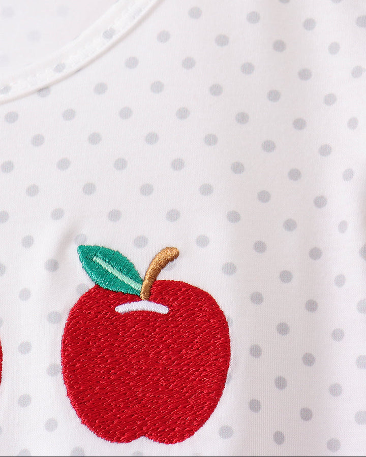 Polka dotted shirt with embroidered apple