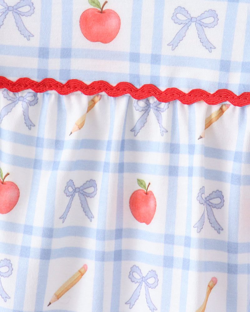 Blue gingham fabric with apple, bow and popsicle prints, scalloped ruffle trim