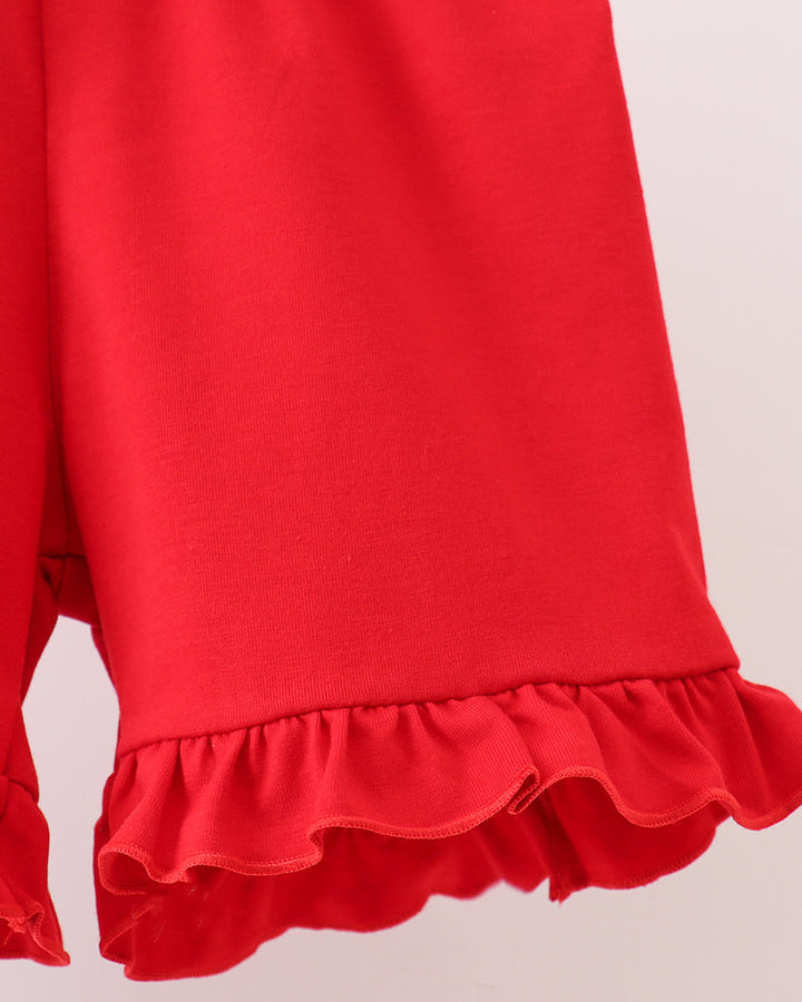 Girls red knit shorts with elastic waist and layered ruffled hem