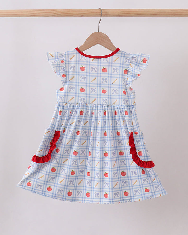 Blue gingham ruffle dress with apple print and red pocket accents, short sleeves