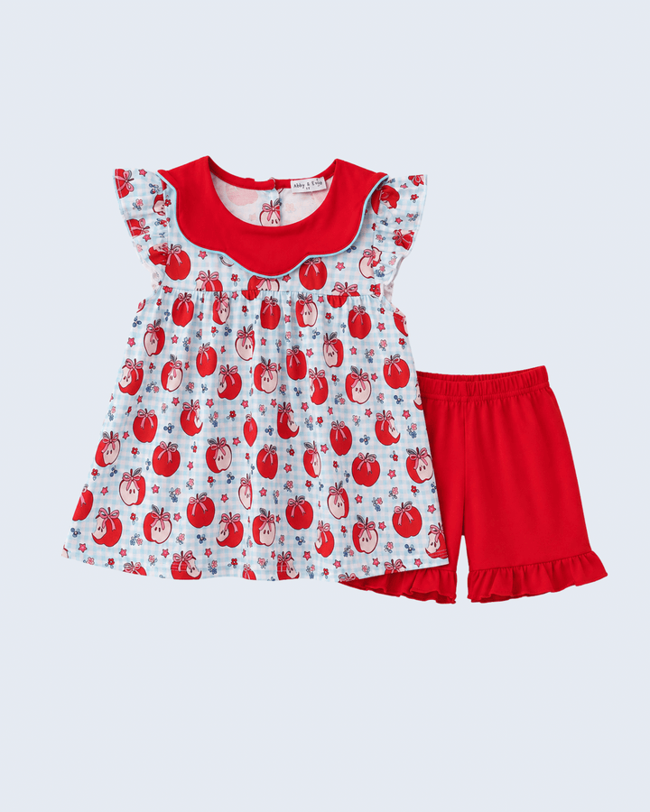 Kids apple-print tunic top with red ruffle neckline and matching red shorts set