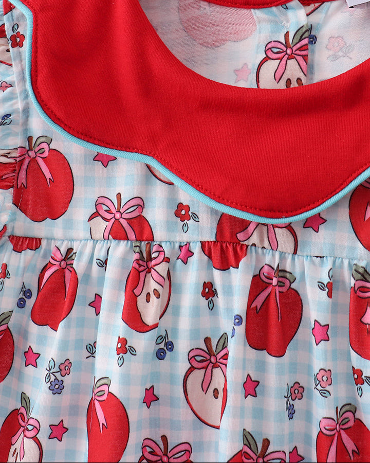 Apple-print baby dress with bright red Peter Pan collar and ruffled neckline