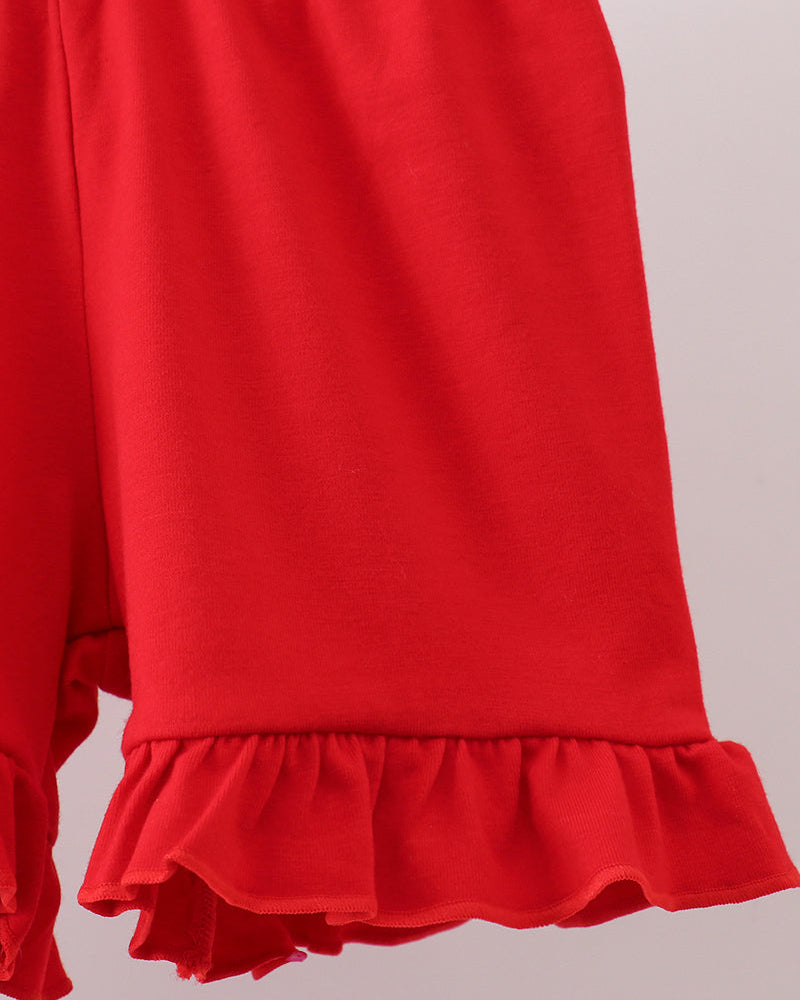 Red shorts with gathered waist and layered ruffle hem