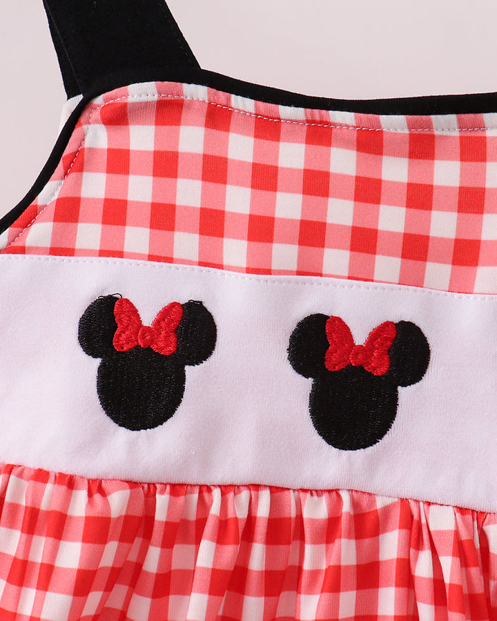 Character embroidery on red plaid dress