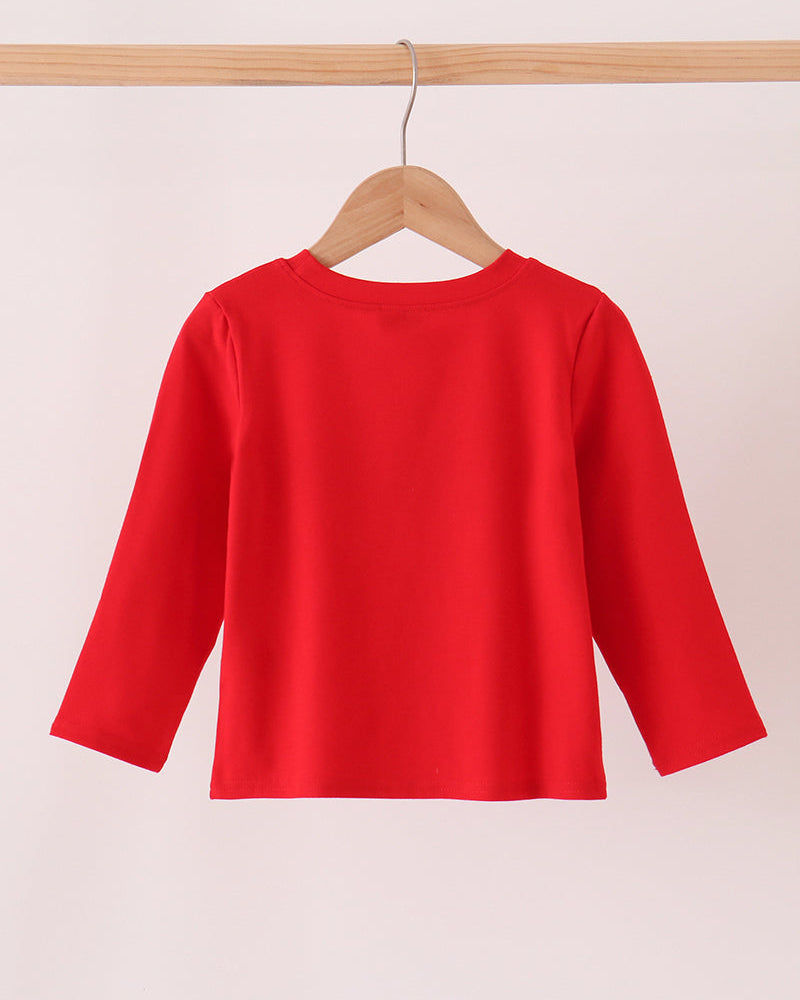 Red long-sleeve top on hanger with wide crew neckline