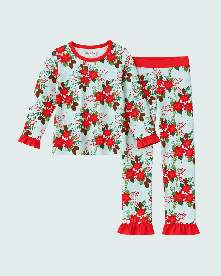 Floral bamboo pajama set with ruffle cuffs; white base, red and green poinsettia print