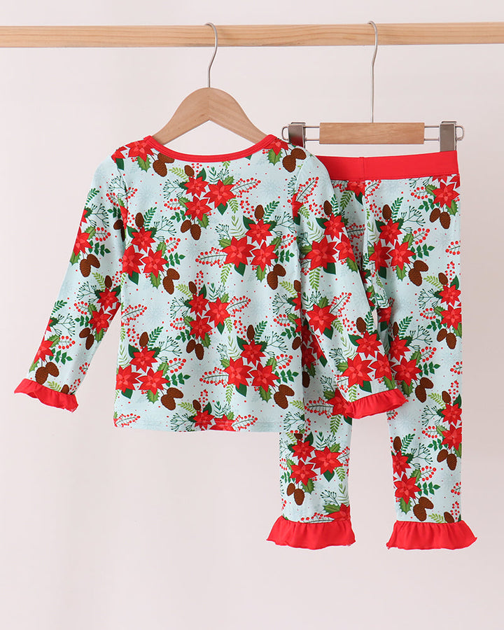 Kids floral ruffle bamboo pajama set with red flowers and green leaves on light blue