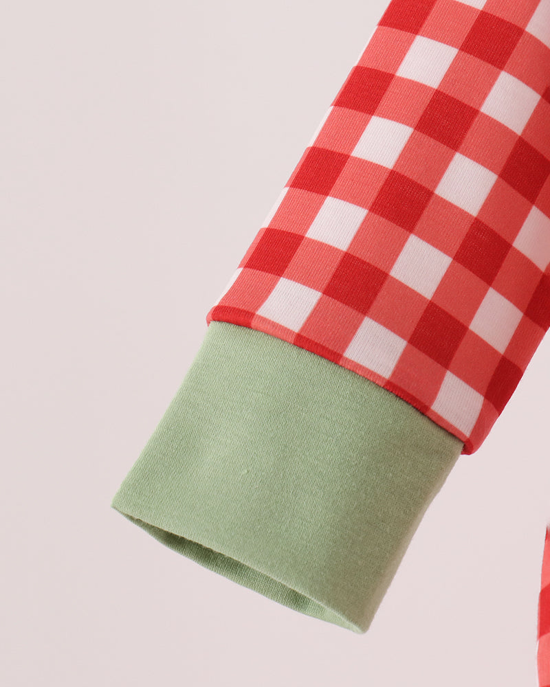 Red and white gingham romper sleeve with green cuff hem