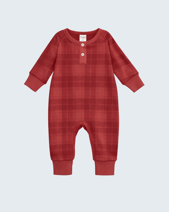 Red plaid cotton henley romper, front view with long sleeves and button placket