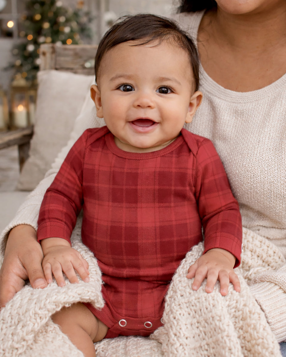 Red plaid long-sleeve baby bodysuit with snap buttons