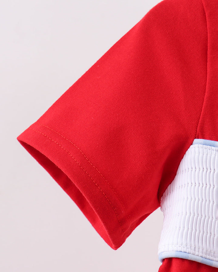 Red kids smocked T-shirt with white ruffle hem detail