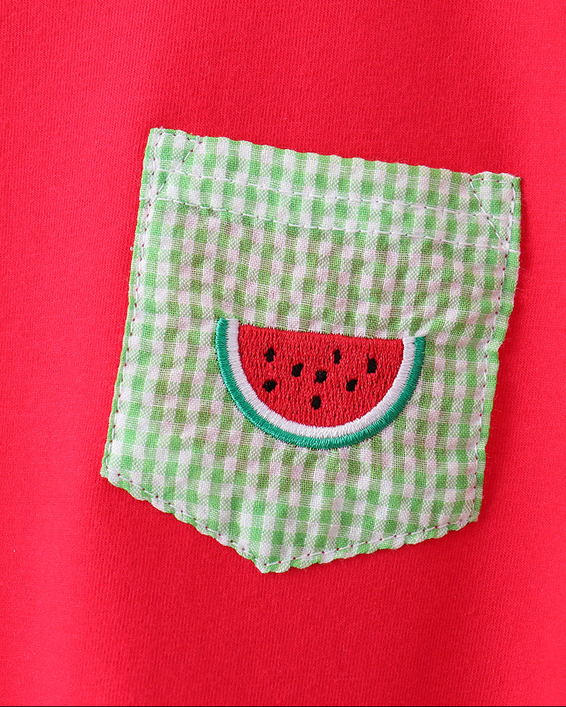 Red shirt with a green checkered pocket featuring a watermelon design.