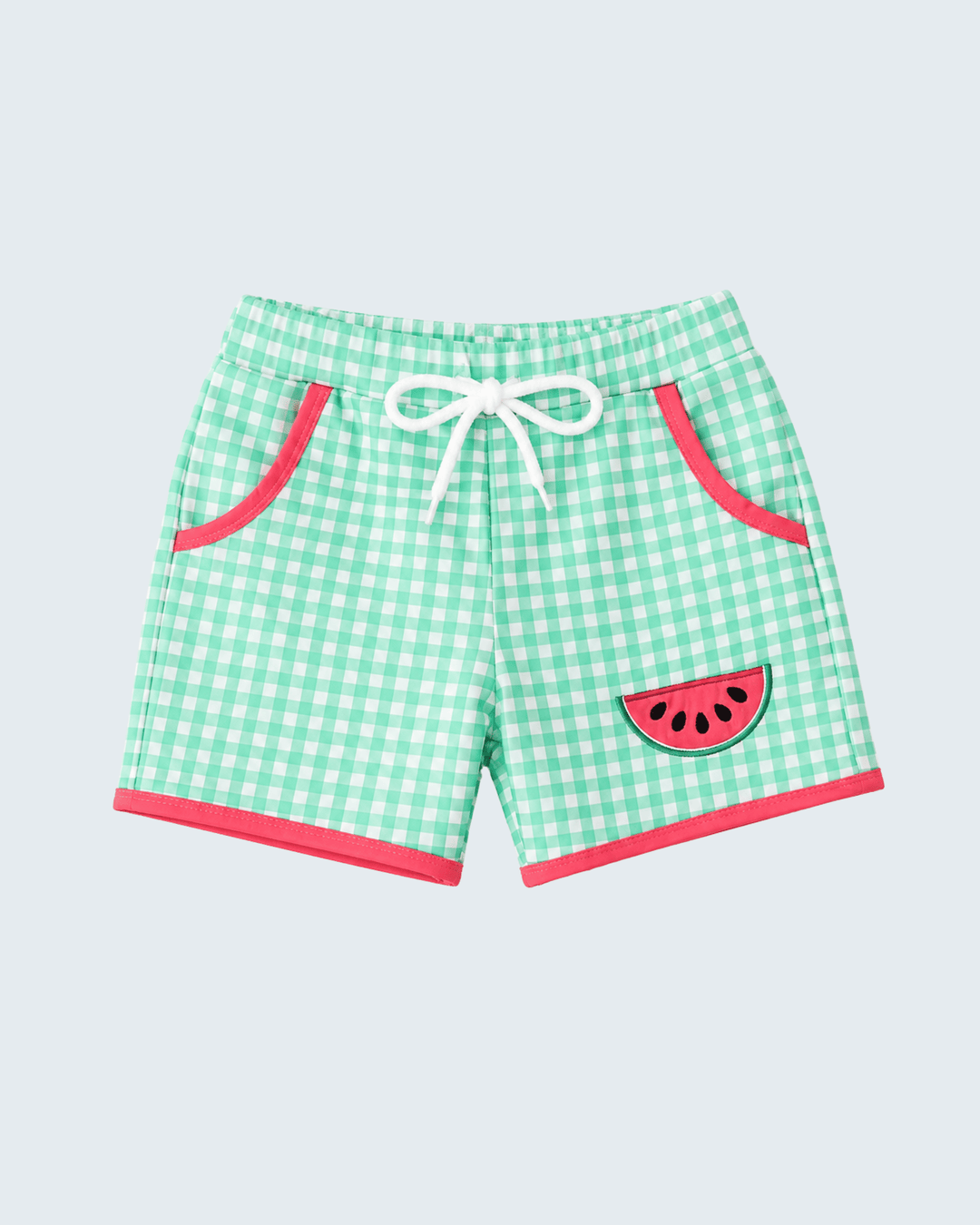 Green gingham shorts with watermelon design on a light gray background