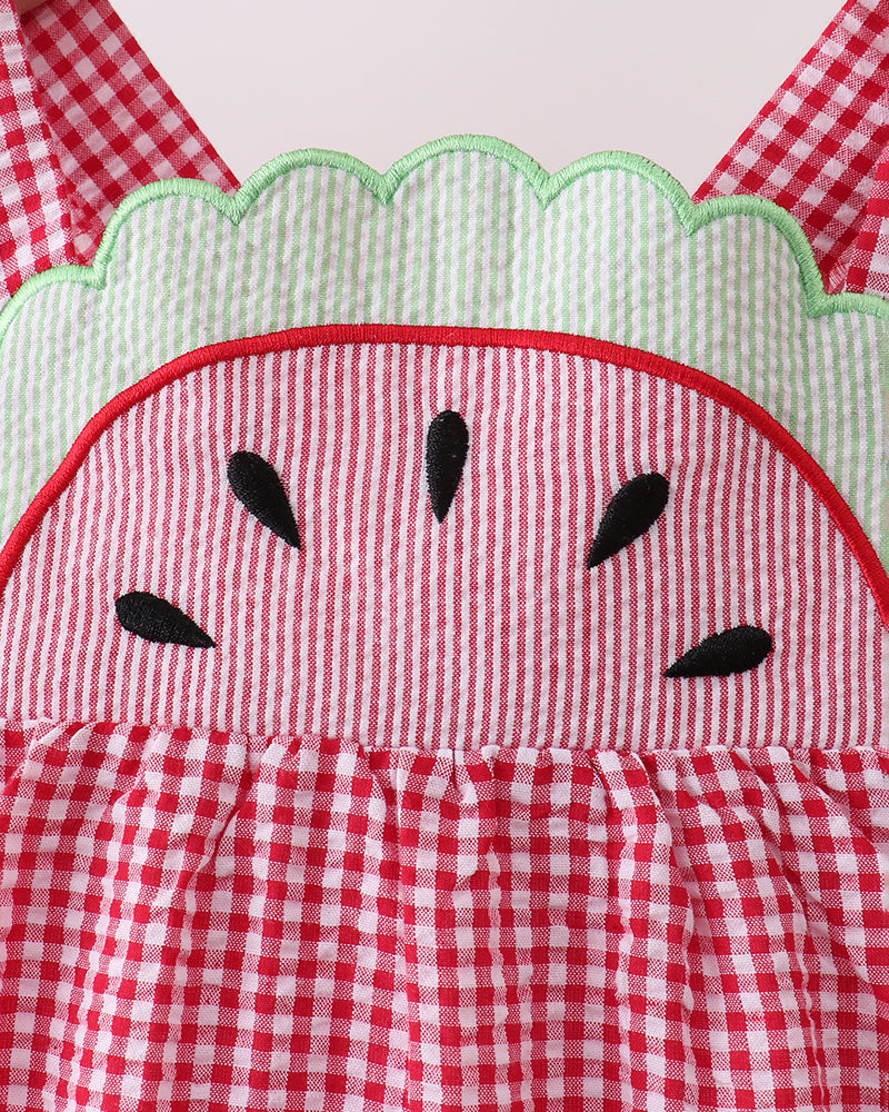 Red and white checkered dress with watermelon design on a white background