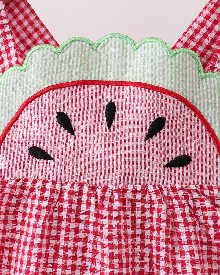 Red and white checkered dress with watermelon design on a white background