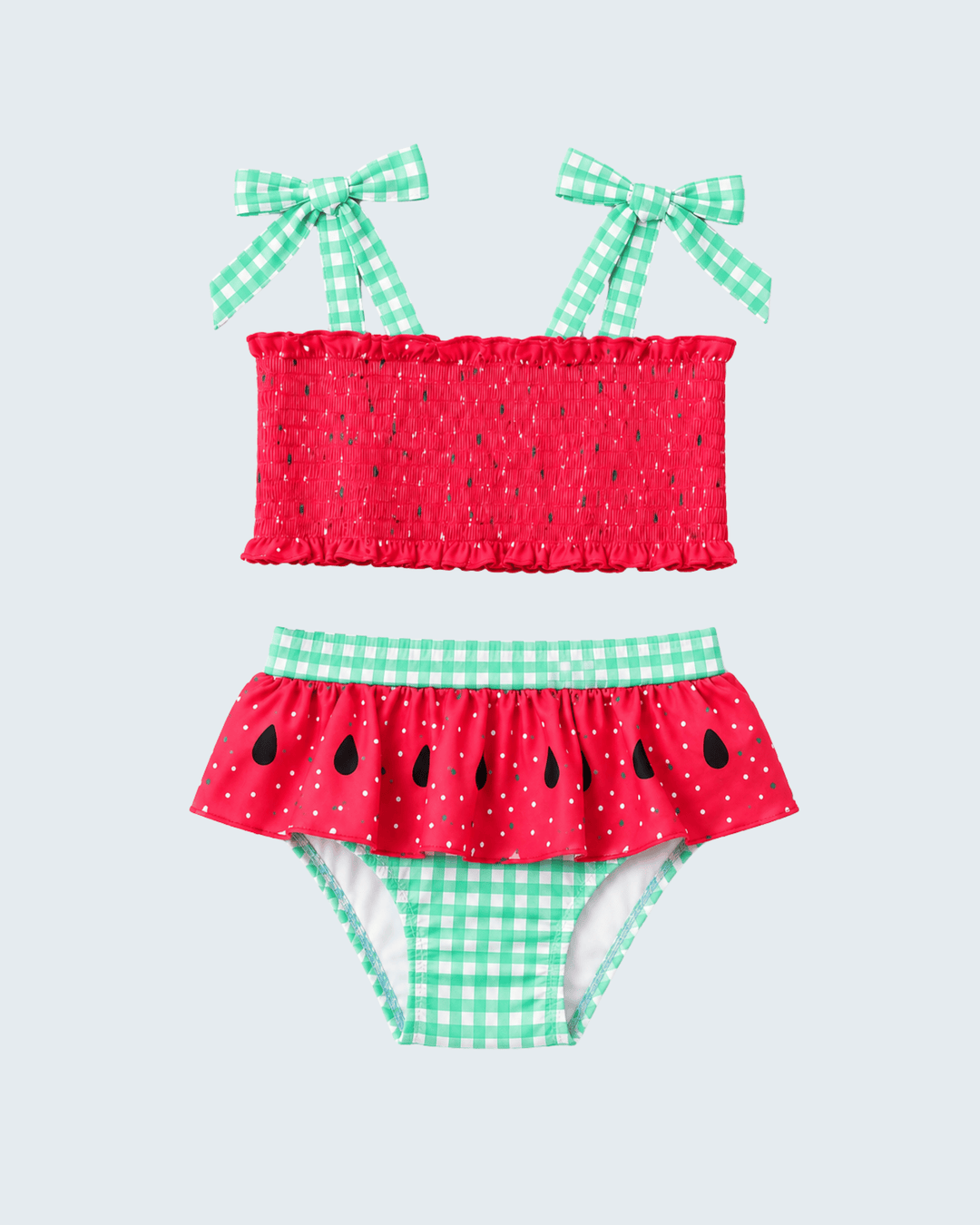 Children's two-piece swimsuit with watermelon design on a light gray background