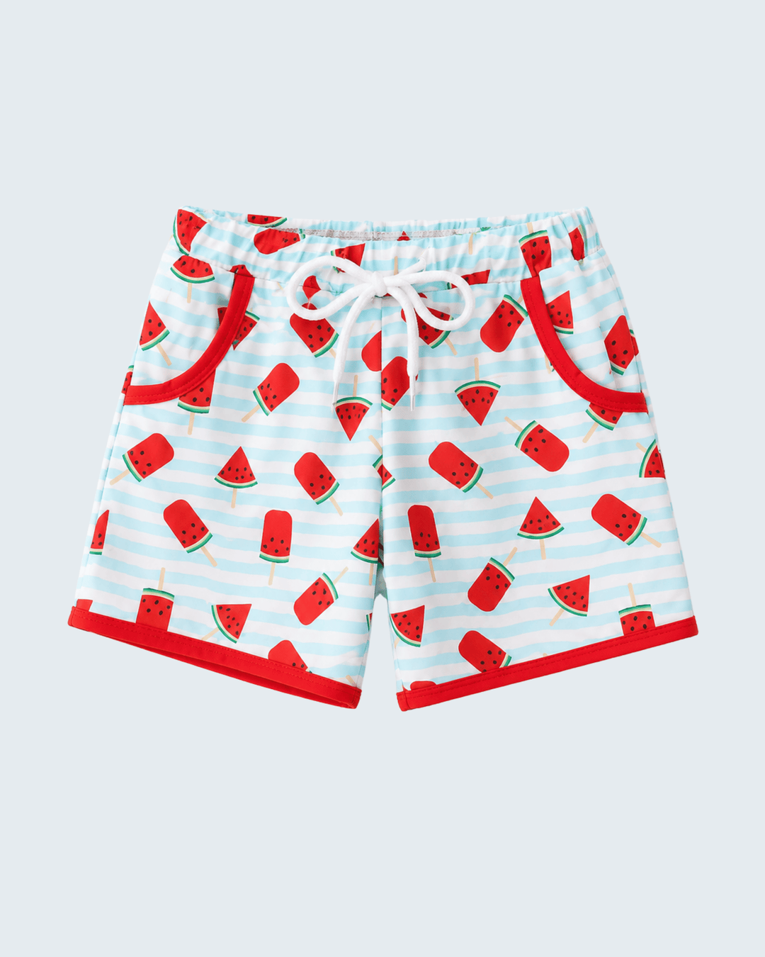 Children's swim shorts with watermelon pattern on a light blue background
