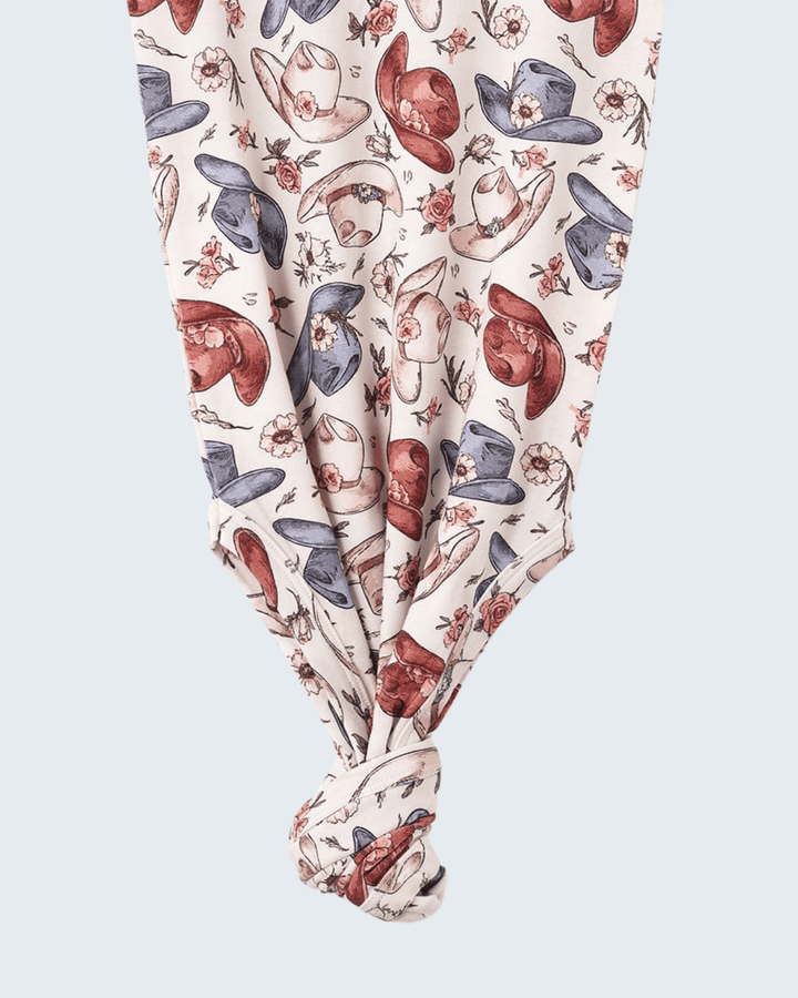 Bamboo knot gown detail: allover cowgirl hat and boot print with knotted front hem