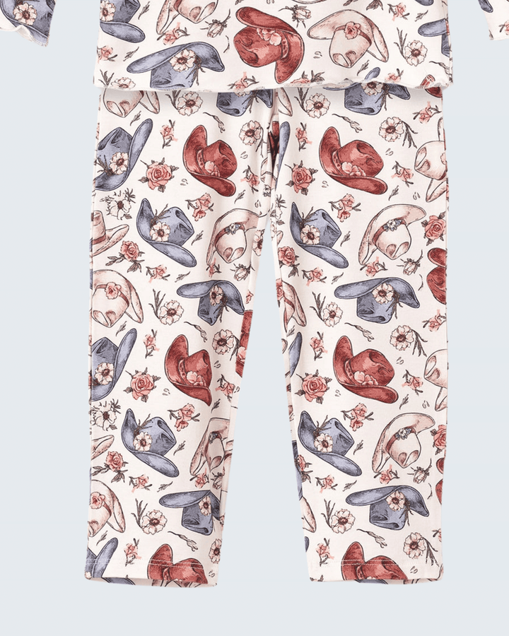 Pajama pants in cream with bird, heart, and flower pattern, full length