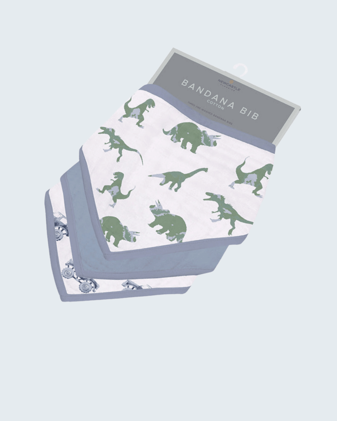 Bandana bib with green dinosaur pattern on a light blue background