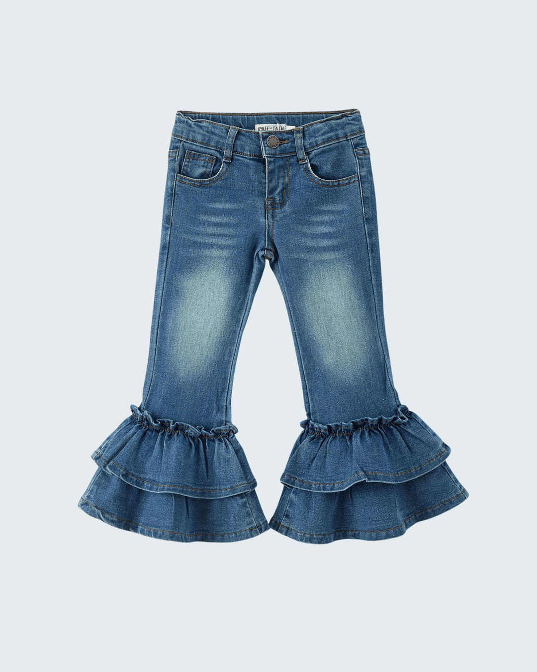 A pair of blue denim flare jeans for kids, featuring a classic five-pocket design, a medium-wash faded texture, and double ruffled hems at the bottom of the flared legs, shown against a light gray background.