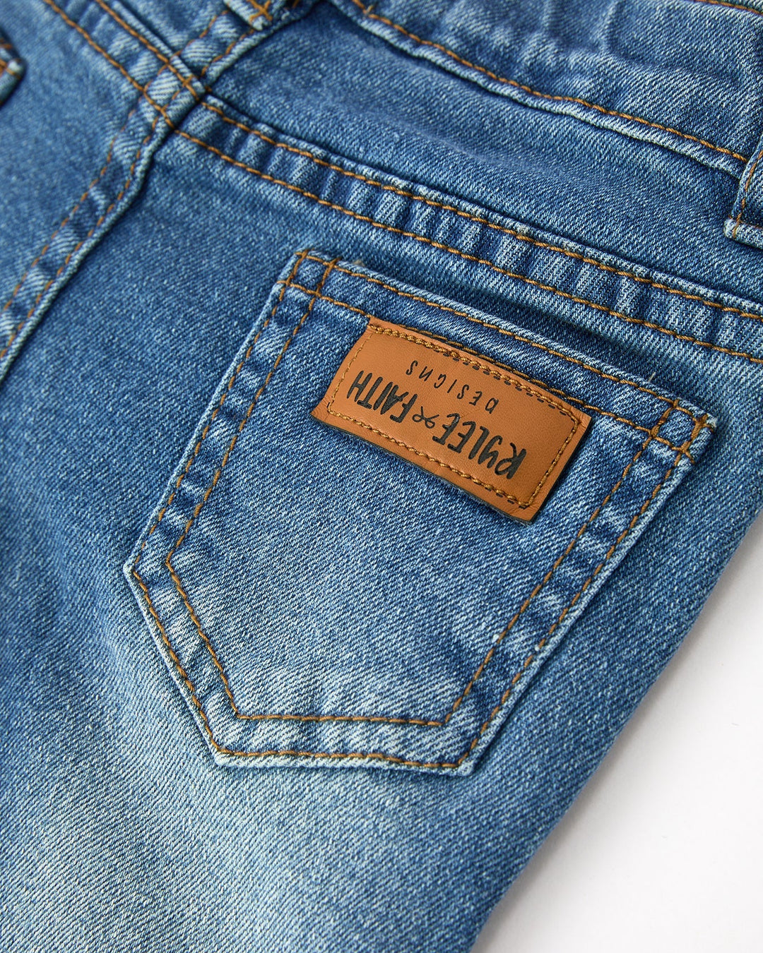 Girls denim jeans label patch on front pocket