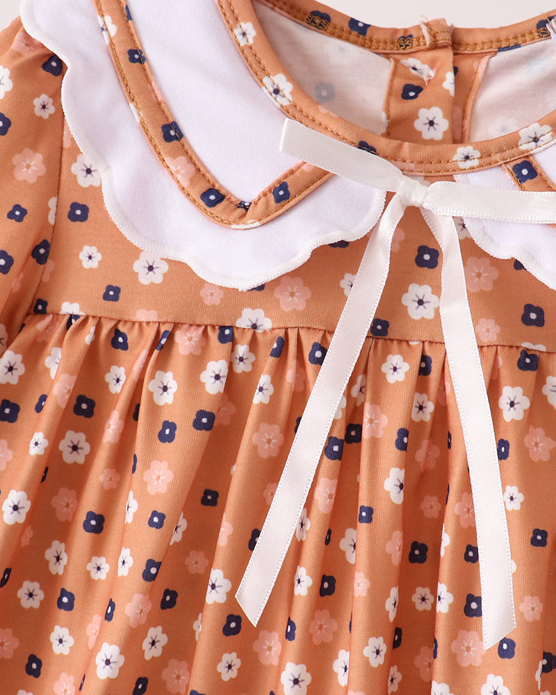 Rust orange floral dress with white Peter Pan collar and bow ties
