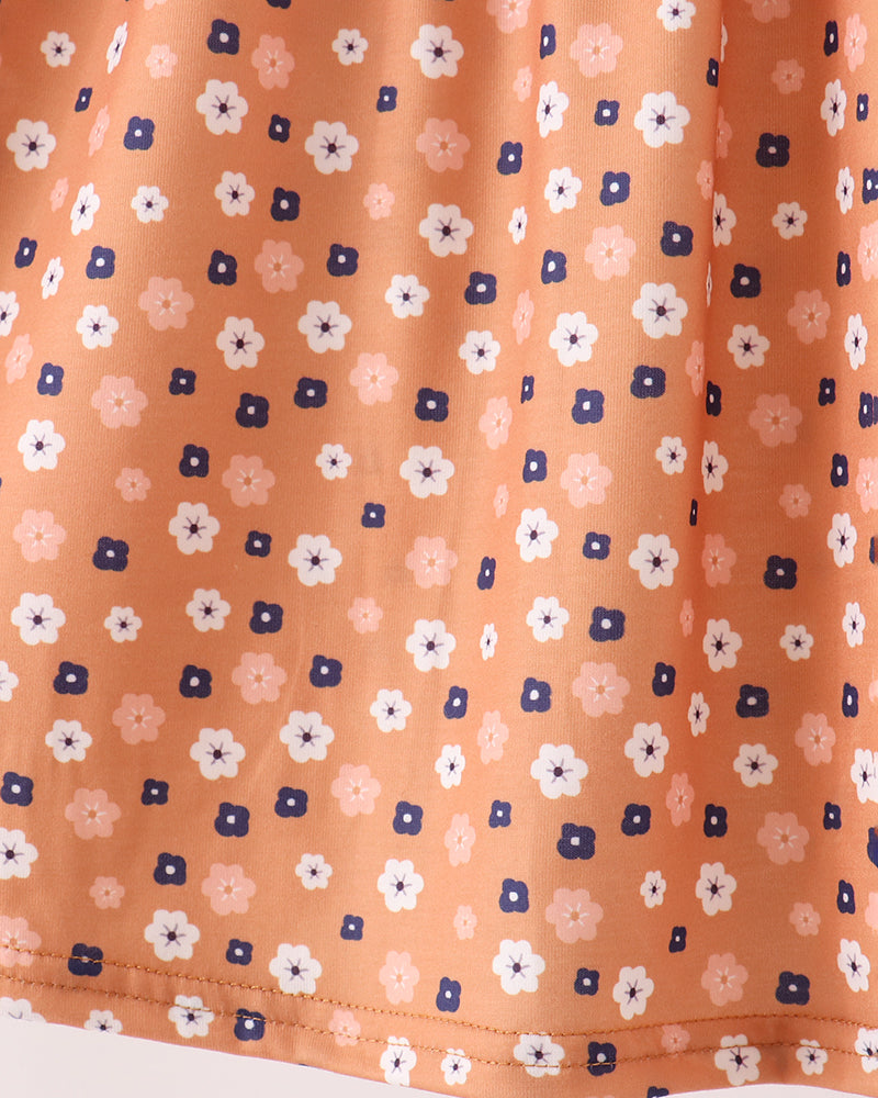 Rust orange floral dress bodice with gathered skirt and white ribbon ties